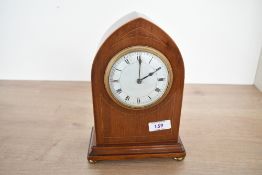 A fine Edwardian mahogany lancet top mantel clock, featuring satinwood inlay and Roman numeral