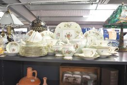 A fine early 20th-century Mintons floral tea set, to feature traditional floral sprays upon a mint
