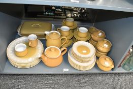 A large selection of 20th-century Denby Pottery 'Ode' tableware, featuring a mustard yellow and