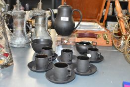 A 20th-century Wedgwood 'black basalt' coffee service, to feature coffee cups, saucers, coffee