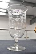 A Victorian etched glass celery vase, featuring delicate star and foliate detailing, pontil mark