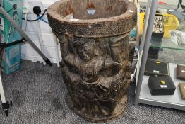 Of ethnographic interest, a large early to mid 20th-century Balinese hand-carved tree trunk planter,
