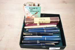 A selection of fountain pens, ballpoint pen and pencil. A Boxed Parker Duofold in grey, Parker