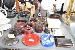 A large selection of early to mid 20th-century bakelite ashtrays and related ephemera, to feature
