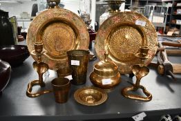 A selection of vintage Middle Eastern-style brass ware, to feature two cobra formed candlesticks,