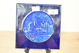 An unmarked Burmantofts pottery Castle Ruin tile, of square form with central circular vignette