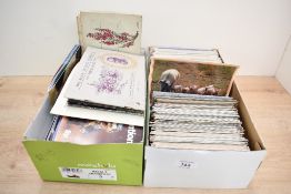 A selection of vintage cigarette card albums, to include wildflowers, motor cars, wild animals and