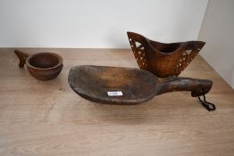 Of ethnographic interest, two 20th-century Papua New Guinea wooden ceremonial drinking cups, to