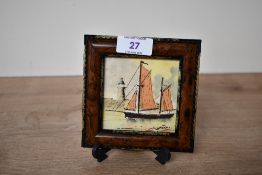 A small vintage watercolour painting of a boat against a light house, of sweet proportions with a