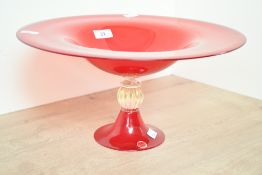 A large mid 20th-century Italian Murano red glass footed centrepiece bowl, featuring a fluted stem