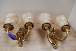 Two vintage ornate double-headed metal wall sconces, having marbled glass shades, unmarked, wall