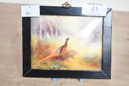 A framed Victorian Royal Worcester porcelain pheasant plaque after James Stinton (1870-1961),