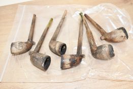 A selection of presumed 19th-century clay tobacco pipes, to feature a Dublin example and a