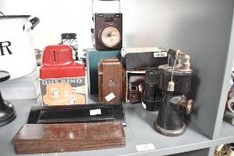 A selection of early to mid 20th-century bakelite ware, to feature a selection of brown door plates,