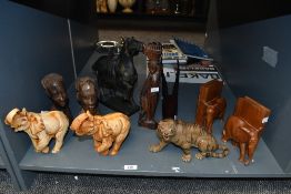 A quantity of 20th-century wooden and ceramic ethnographica, to feature two African wooden