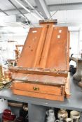 A vintage French Jullian beechwood artists easel, having brass fittings, a metal-lined drawer and of