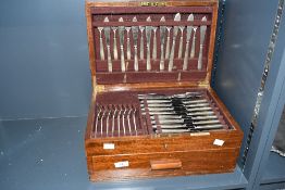 A large 20th-century Elkington and Company of Birmingham 'Elkington Plate' wooden cutlery canteen,