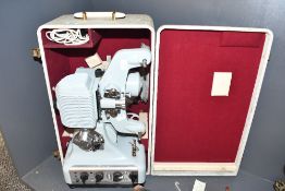 A vintage Italian Cirse Sound 8mm projector, of a light blue colour in original case, 47cm in
