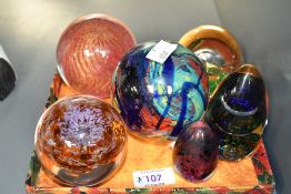 A quantity of 20th-century studio glass paperweights, to include a Wedgwood round purple and brown