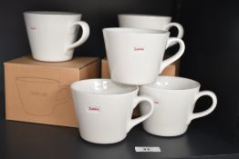 A selection of 20th-century Keith Brymer Jones 'Word' porcelain mugs, to feature 'Love' and 'Hot',