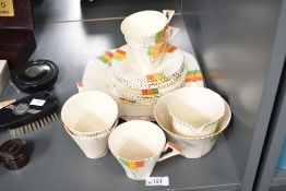 A 1930's Alfred Meakin Art Deco design part tea set, the conical cups with angular handles and