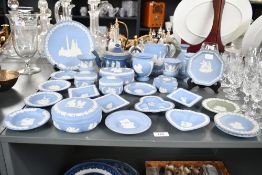 A selection of 20th-century Wedgwood blue jasperware, to include small jewellery trays, lidded