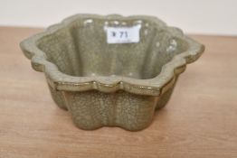 A large Chinese Ge ware brush washer, featuring mallow-shaped petals and five spur marks to base,