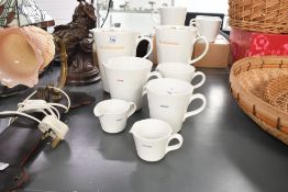 A selection of 20th-century Keith Brymer Jones 'Word' porcelain jugs, to feature 'mix and
