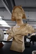 A late 19th to early 20th-century A. Richard alabaster-style pottery bust, featuring a young girl