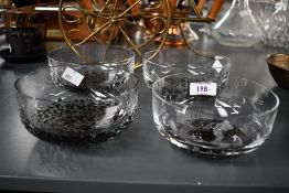 Four 20th-century Italian-style art glass bowls, featuring textured speckled bases, unmarked, (4),