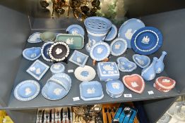A large selection of 20th-century Wedgwood blue, black, green and pink jasperware, to include