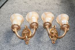 Two vintage ornate double-headed metal wall sconces, having marbled glass shades, unmarked, wall