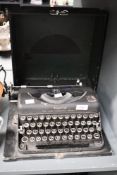 An early to mid 20th-century Imperial 'The Good Companion' Model T portable metal typewriter,