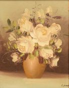 Lynn (20th Century) Oil on canvas still life, a study of a vase of white roses, signed lower