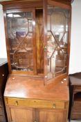 A 19th Century and later mahogany composite bureau bookcase having astral glazed section over drop
