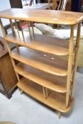 A vintage Ercol 'Baby Giraffe' bookshelf/divider , approx. height 127, width 91, depth 31cm