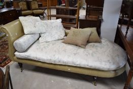 A vintage chaise longue in the classical style, by Tetrad. Aniline dyed leather, shadow silk cover