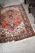 A traditional Persian rug, approx. 152 x 106cm
