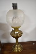 A traditional oil lamp having smoke glass chimney spherical part etched shade
