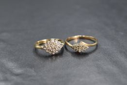 A 9ct gold diamond set cluster ring, the central quatrefoil within a lozenge motif setting, marked