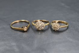 A group of three 9ct gold diamond set rings, comprising an illusion set diamond chip solitaire, a