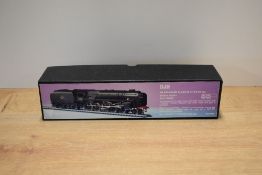 An OO gauge model of a British Railways Standard Class 9F 2-10-0 steam locomotive and tender,