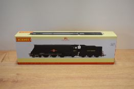 A Hornby OO gauge model steam locomotive and tender representing the Southern Railway (SR)