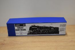 A kit-built OO gauge model steam locomotive and tender, manufactured by Crown Line Products Limited.