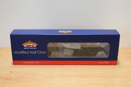 A Bachmann Branch-Line OO gauge model of a Modified Hall Class 4-6-0 steam locomotive and tender.