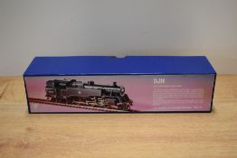 This lot consists of a kit-built model steam locomotive and its original manufacturer's box,
