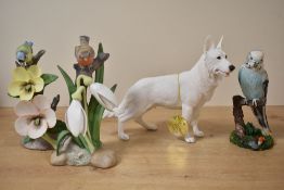 A Leonardo Collection white German shepherd study sold alongside three porcelain bird studies,