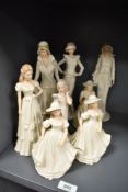 A group of eight The Regal Collection figurines to include 'Romance' model number P073, 'Natalie'