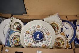 A three cake stands including a Minton 'Haddon Hall' cake stand, Royal Doulton Real Old Willow stand