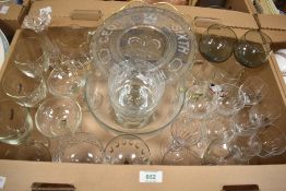 A collection of glassware including a desert set, pressed glass coronation plate and a selection